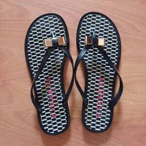Coach Landon jelly flip flop sandals black bow tie US size 6.5 / 7B